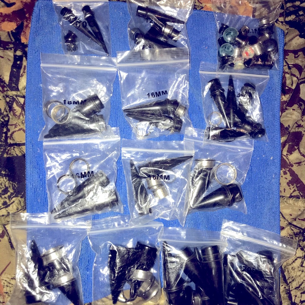 Random tunnels plugs and tapers size 18g to 1 inch